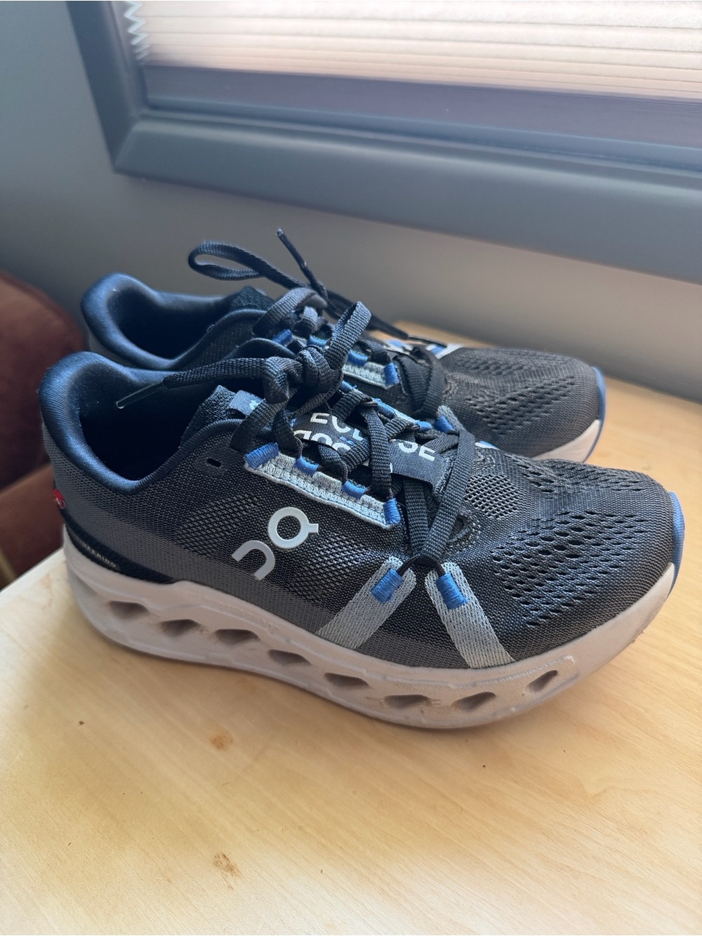 On Running Women’s Athletic Shoes- Cloudultra- Black with Blue Highlights